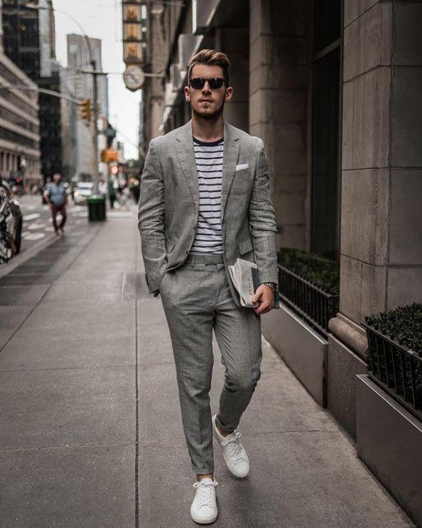 西裤 运动鞋 西装的造型打破传统的优雅绅士风.